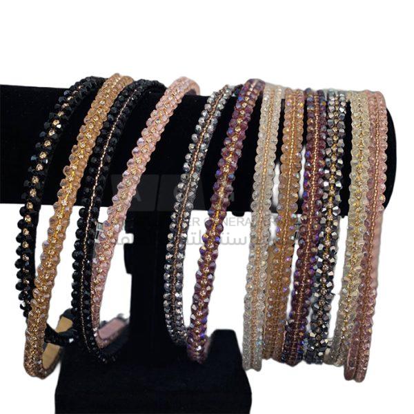 أطواق شعر مخرزه مع صف من الخرز الذهبي